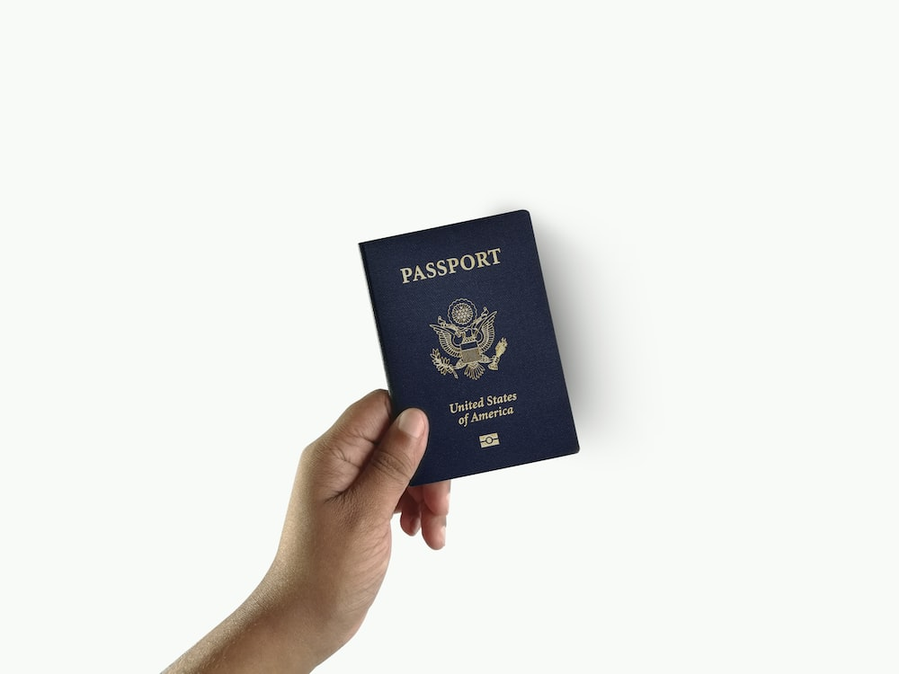 a person holding an American passport