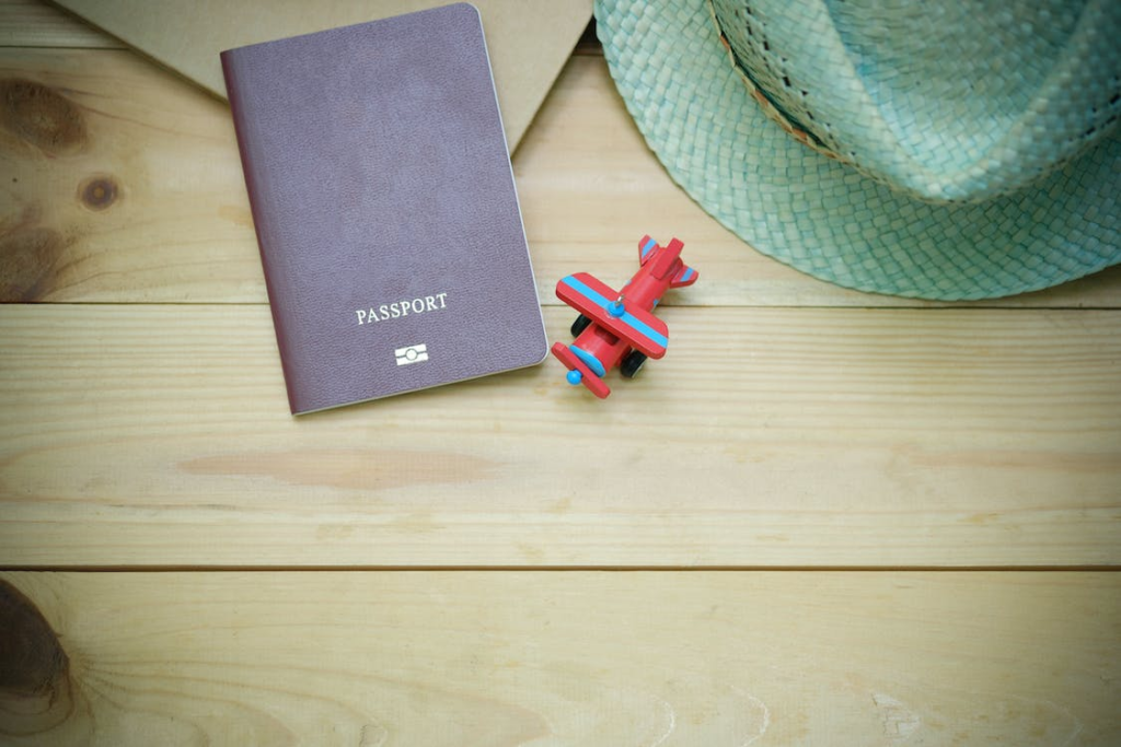 A powerful passport next to a toy plane