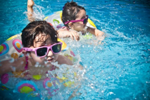 children having fun at the pool