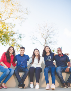 a diverse student group posing for a photograph