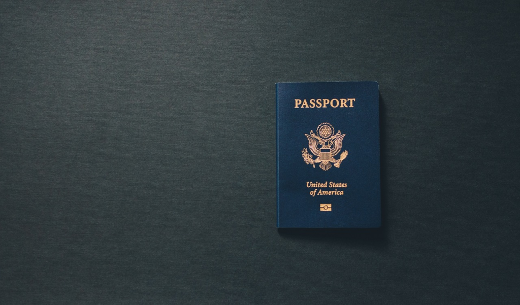 A US passport against a dark background