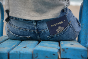 A passport in a person’s back pocket