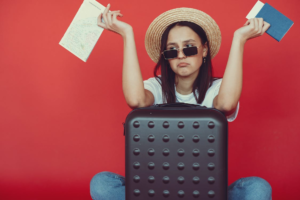 A woman anxiously holding her passport