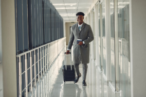 A man with a passport in his hand