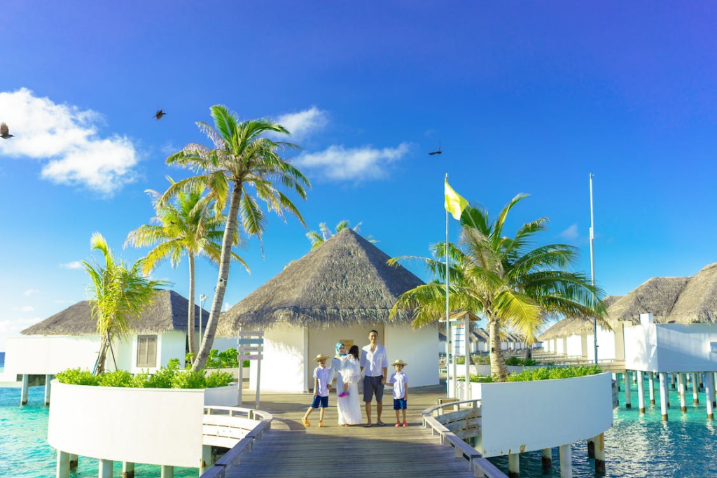 A joyful family gathered at a scenic beach destination.