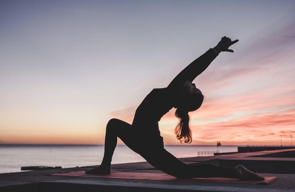 A woman doing yoga.