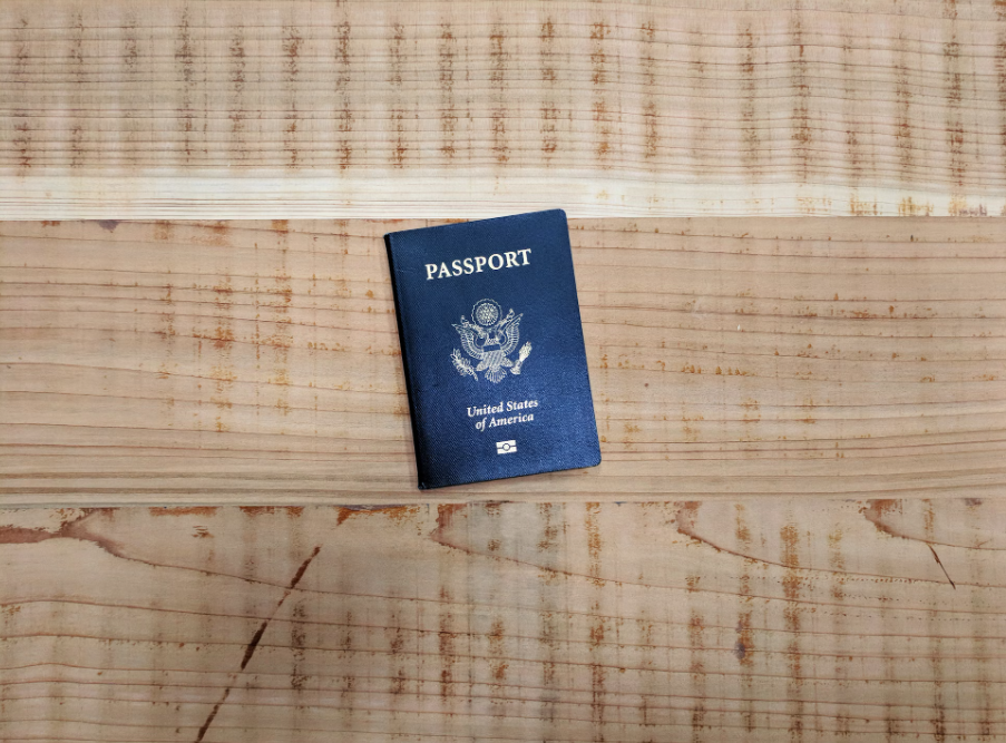 A passport on a table.