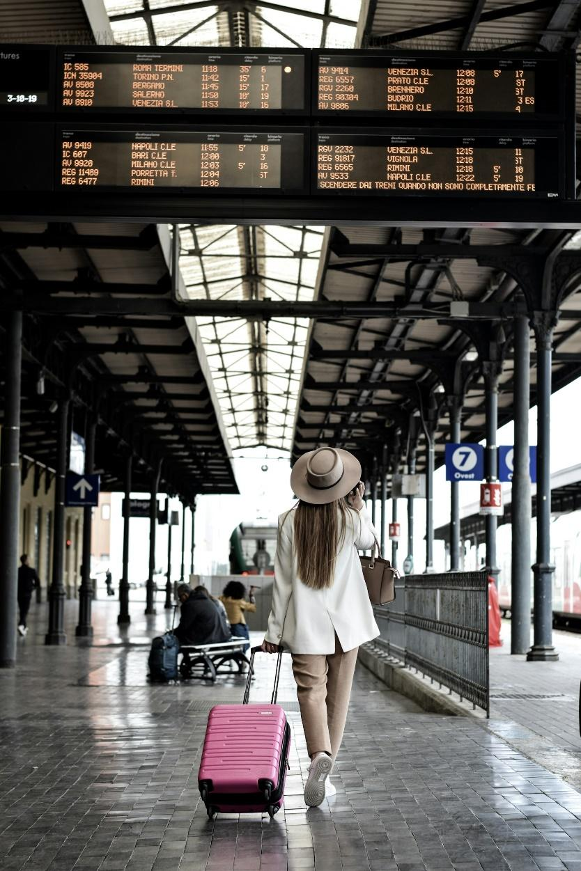 A girl on a train station overseas