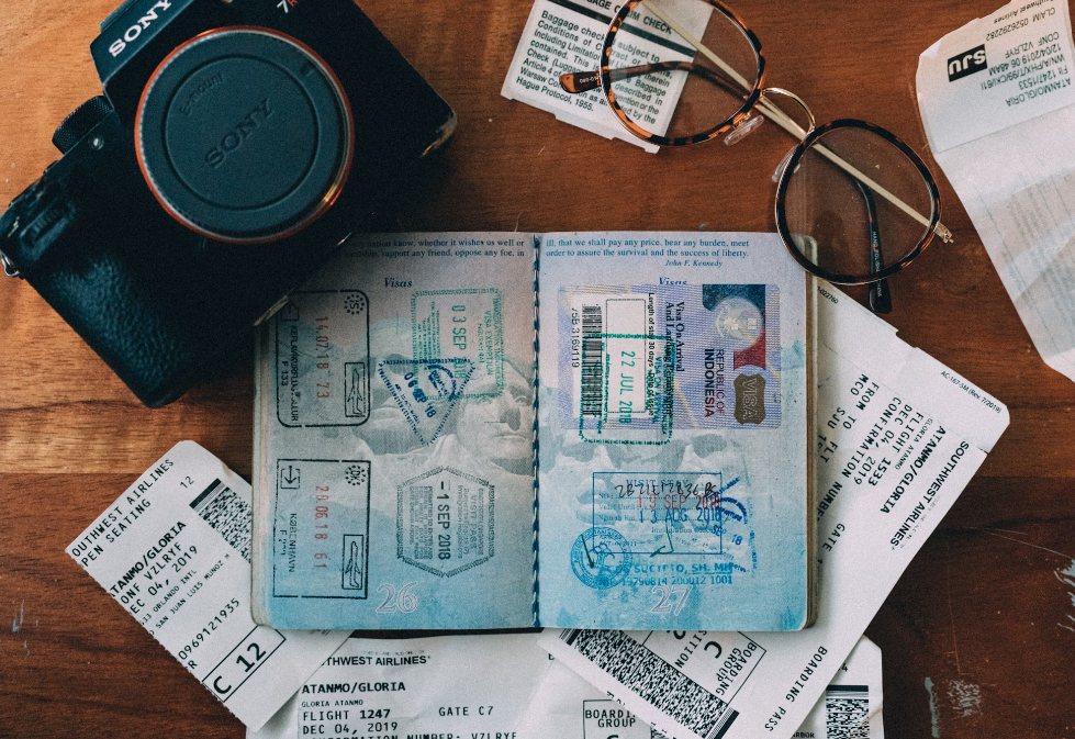 A stamped passport and other travel essentials.