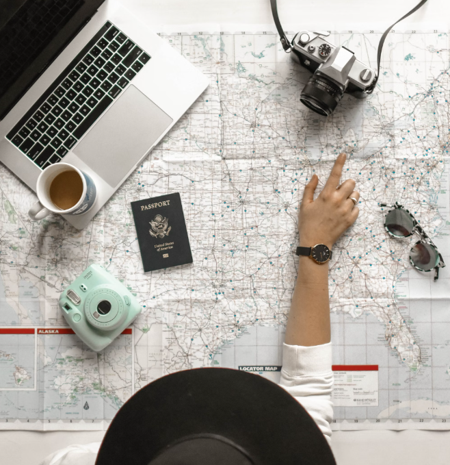 A traveler looking at a map