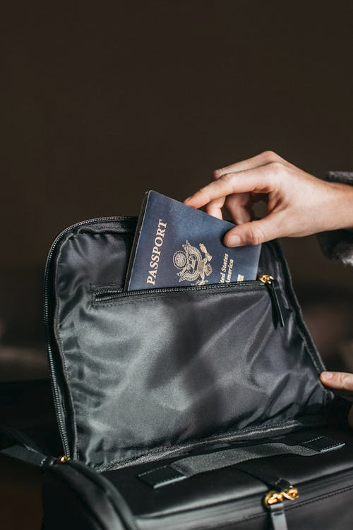 A traveler checking passport validity before a trip. 