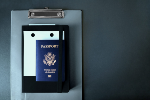 a passport along with a notebook