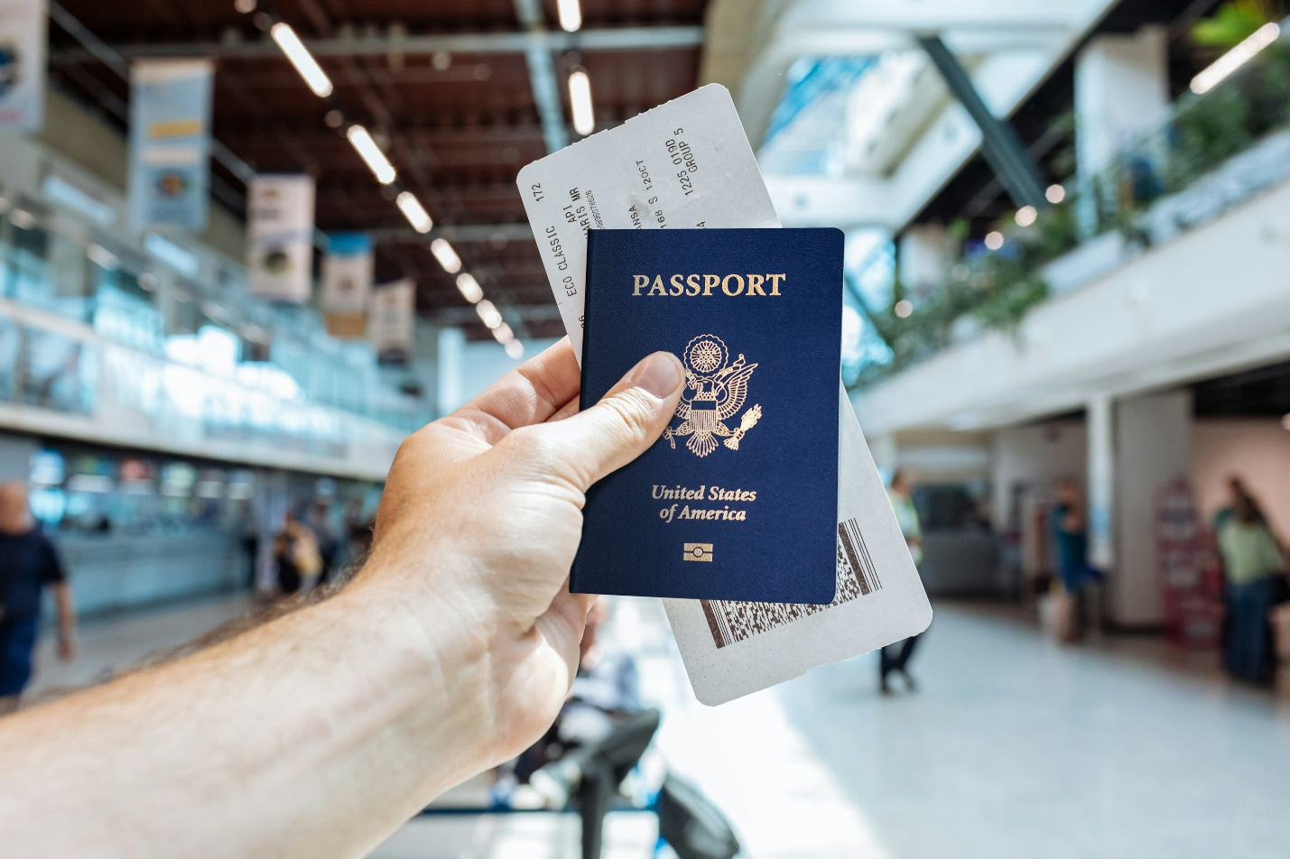 an individual holding their American passport