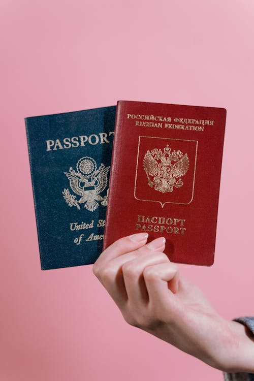 an individual holding two different passports